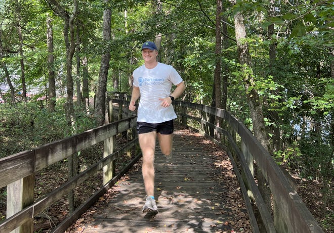 University of Georgia senior Christian Spence will run in an ultramarathon, a race about 31 miles long, on Dec. 16-17, 2023, as a fundraiser for Parkinson's Disease research and to honor his father, who has the disease.