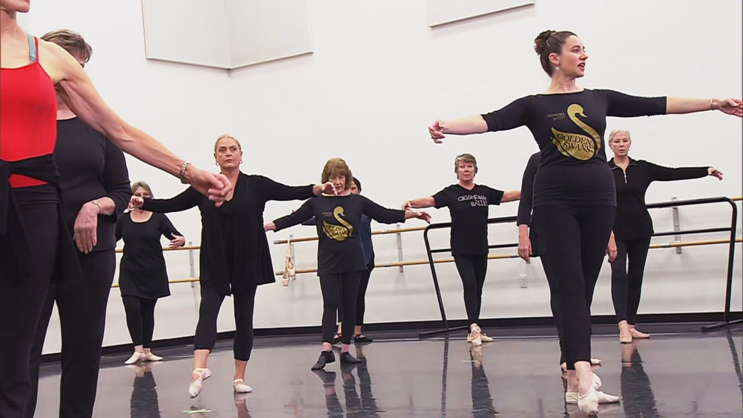 PHOTO: Participants of the Oklahoma City Ballet's "Golden Swans" program take part in a routine.