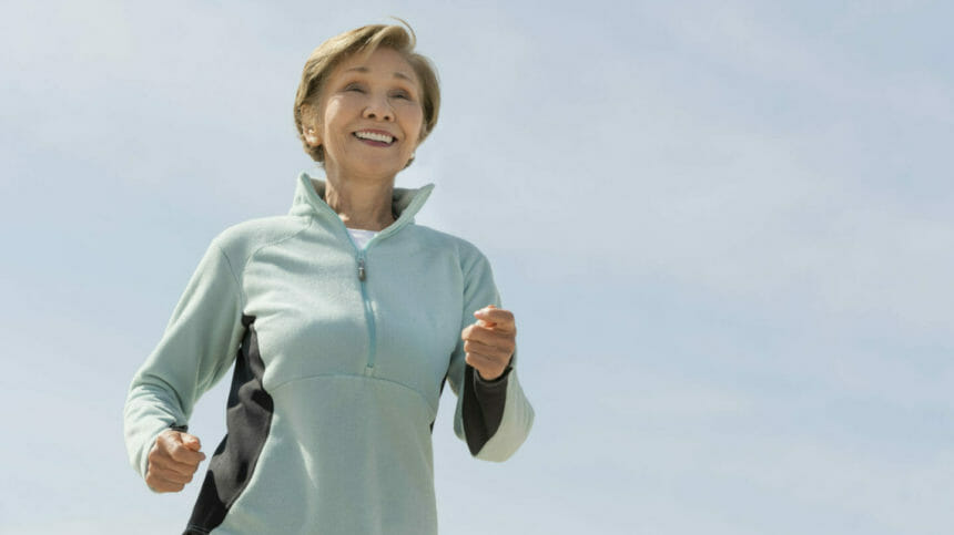 Image of senior woman walking outdoors