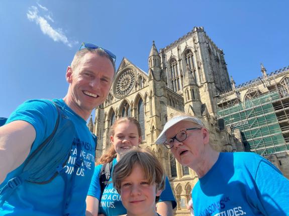 Sue Garland (right) joined by her son Richard and his children Nell and Ellis outside York Minster during a special walk around the city