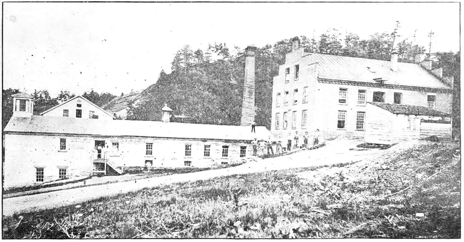 A photo from 1951 of the former Ithaca Paper Company, where townhomes will be built in 2026 next to the former Ithaca Gun Factory (the factory's smokestack can be seen in the background). Credit: Courtesy of DMG Investments