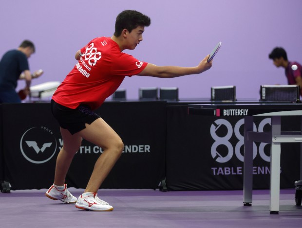 Bosman Botha returns the ball during practice at 888 Table...