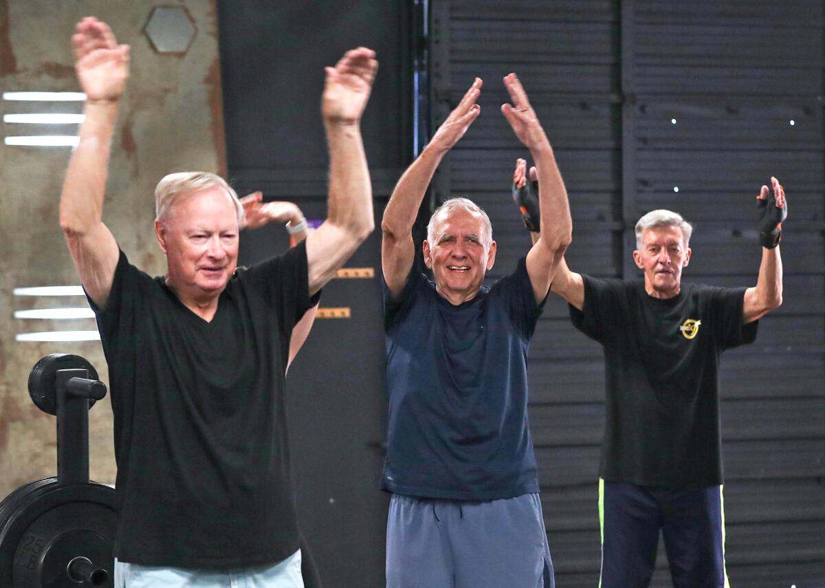 "Parkinson's Fighters" do warm-up exercises as they prepare for Tuesday's class.