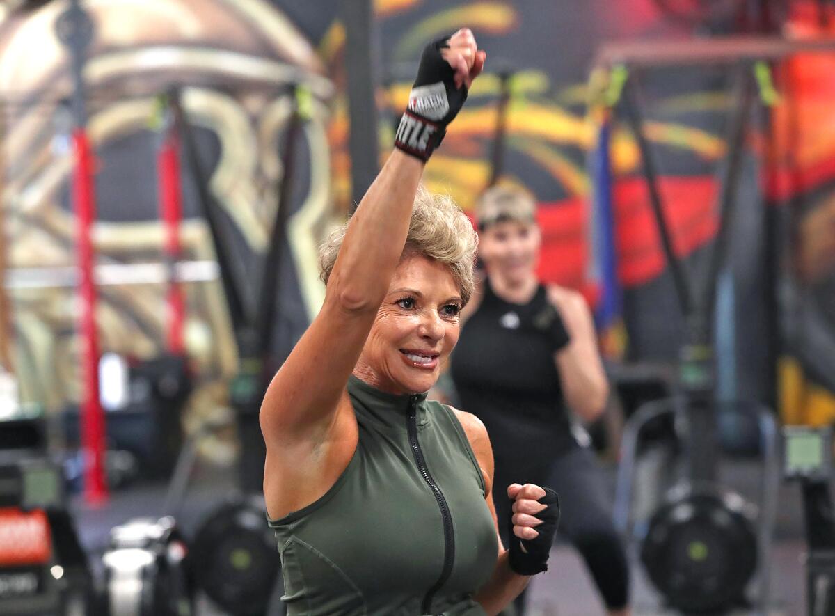 Donna Clervi leads a workout class for those with Parkinson's disease at OC Fit Sky Park.