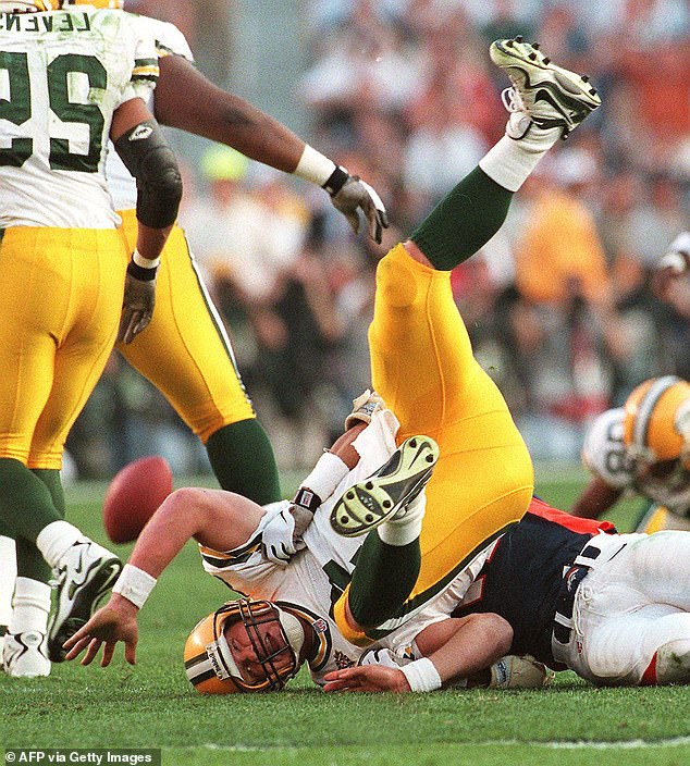 Packers quarterback Brett Favre is sacked by Denver Broncos defender Steve Atwater