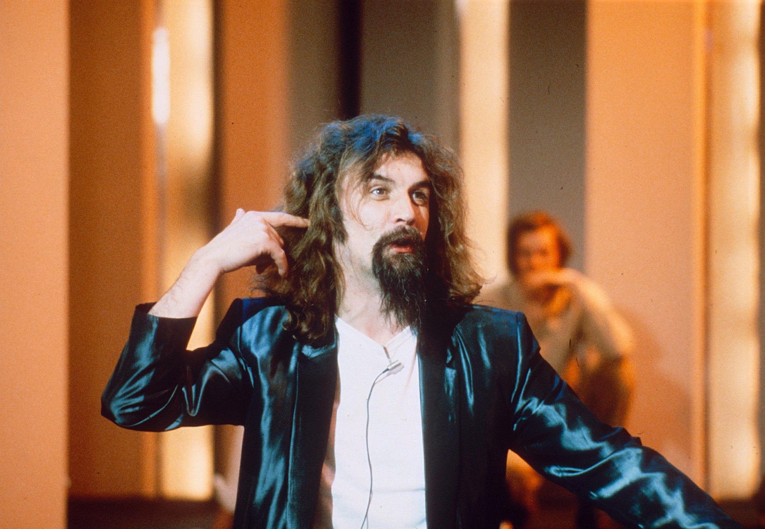 Billy Connolly performing on stage in 1982