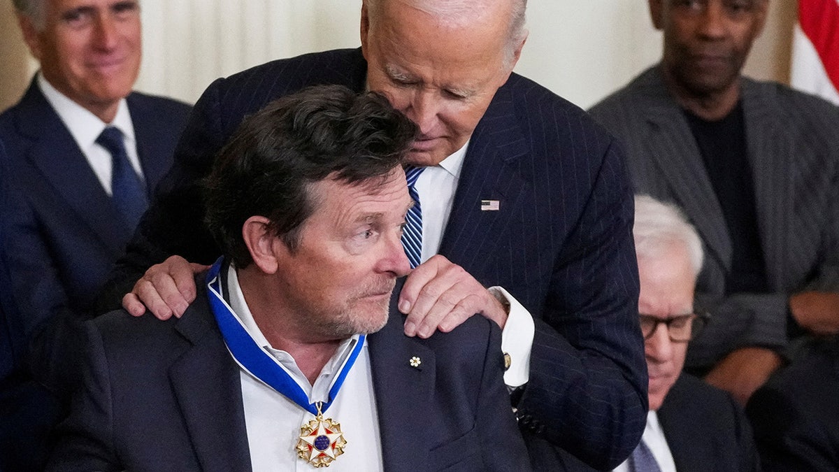 president biden presents Michael j fox with presidential medal of freedom