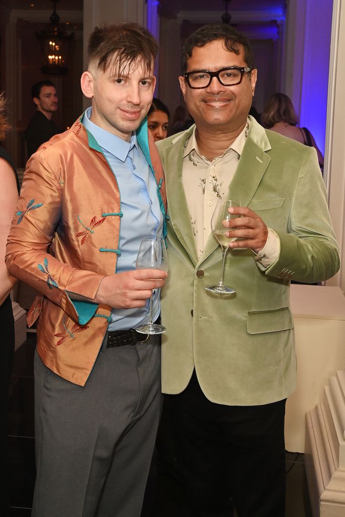 Oliver Levy standing with Paul Sinha