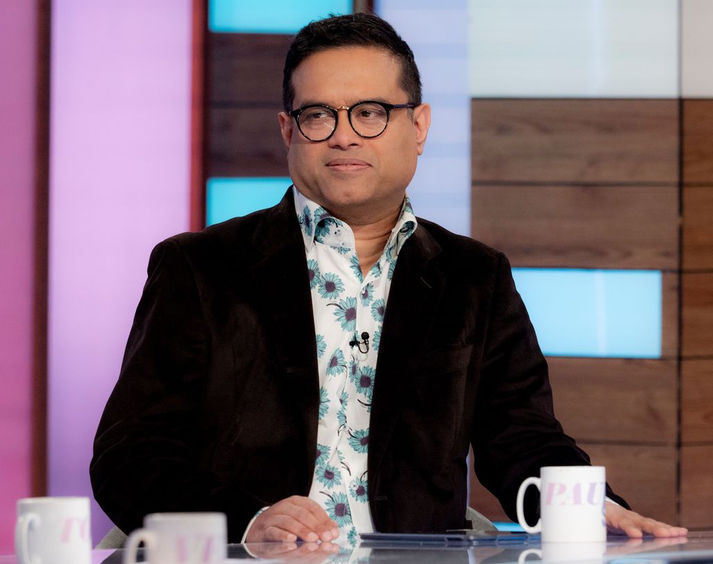 Man in suit in television studio