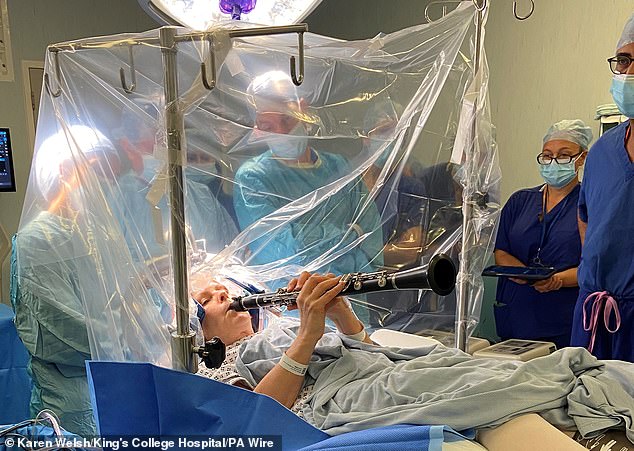 Denise Bacon, 65, experienced instant improvement in her finger movements as the doctors stimulated her brain with an electrical current