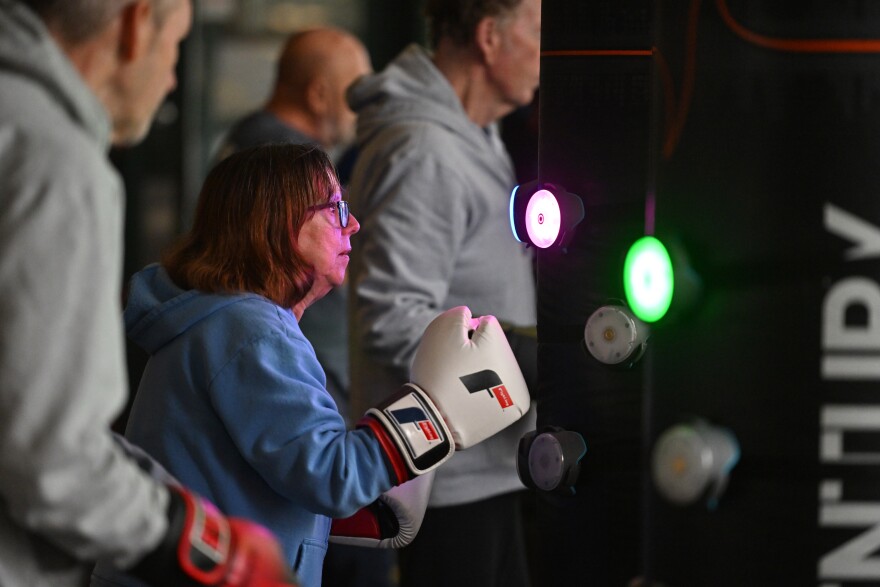 Judy Talerico boxes during a class circuit at Rock Steady Boxing gym in Old Forge.