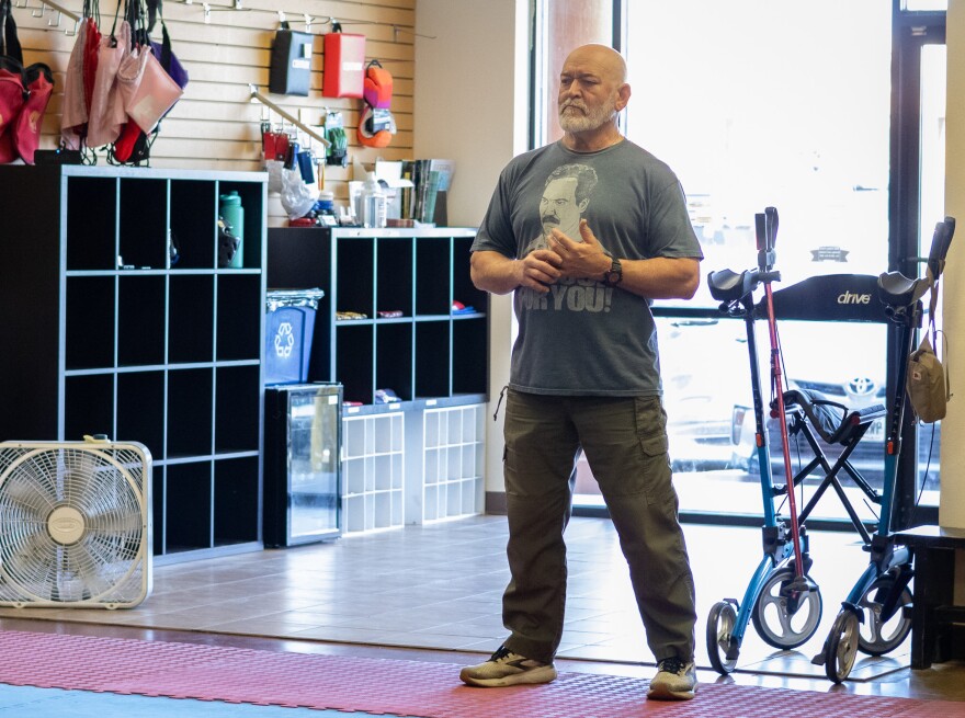 Trainer and founder of More Than Boxing, Steve Payne, observes his clients during a boxing class. He has been offering classes at the Academy of Martial Arts since 2017