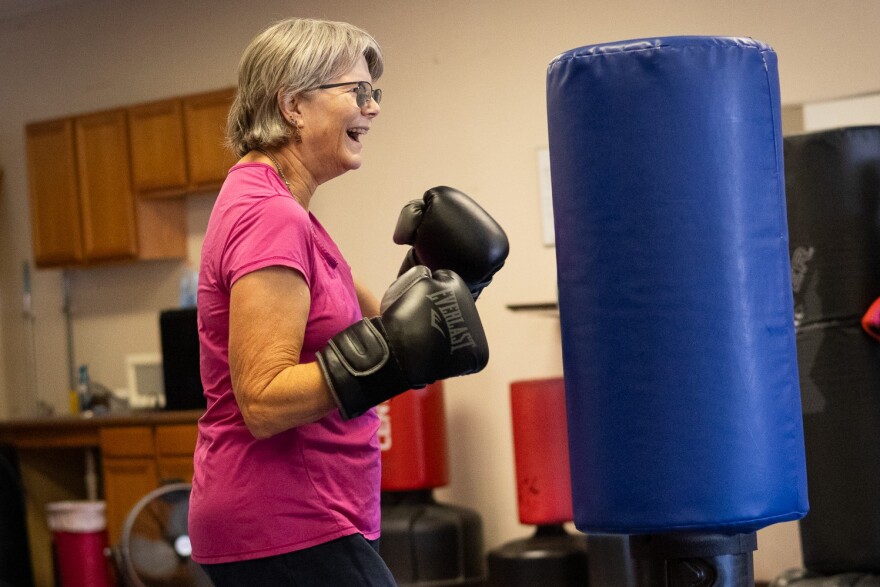Donna Rudolph-Miller prepares for the next boxing round at her More Than Boxing class on Dec. 10, 2025. Miller has been a client of Steve Payne for nine years