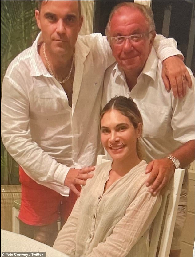 In 2020 Robbie revealed his father Pete had been diagnosed with Parkinson's, admitting at the time that he was fighting 'fear and panic' over his father's diagnosis (Pete pictured with Robbie and his wife Ayda)