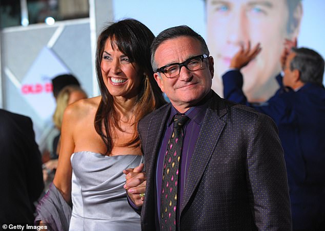 Robin Williams (right) was diagnosed with Lewy body dementia (photographed in 2009 with his wife, Susan Schneider)