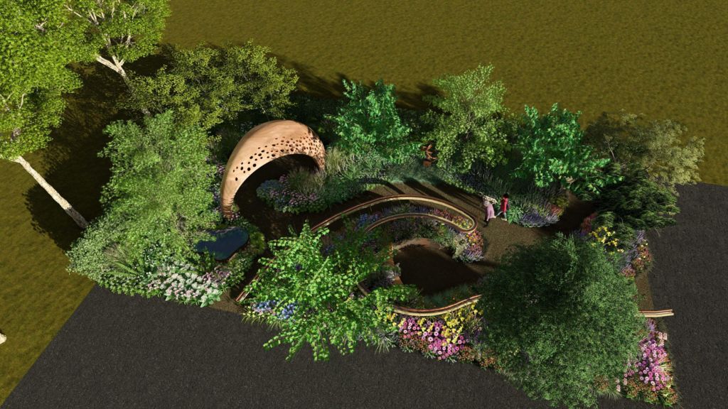 A CGI mock-up of the garden. It is colorful with a weaving footpath cutting through plots of flowers and small trees.